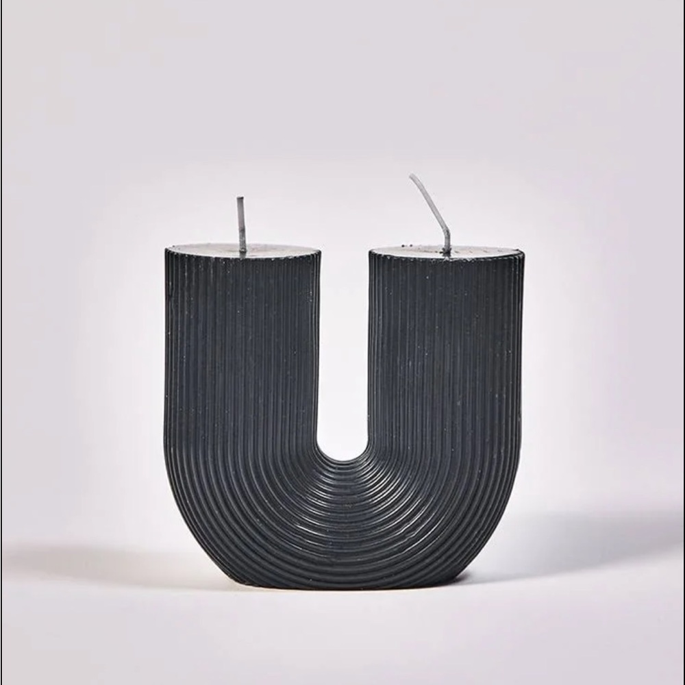 Black U shaped candle